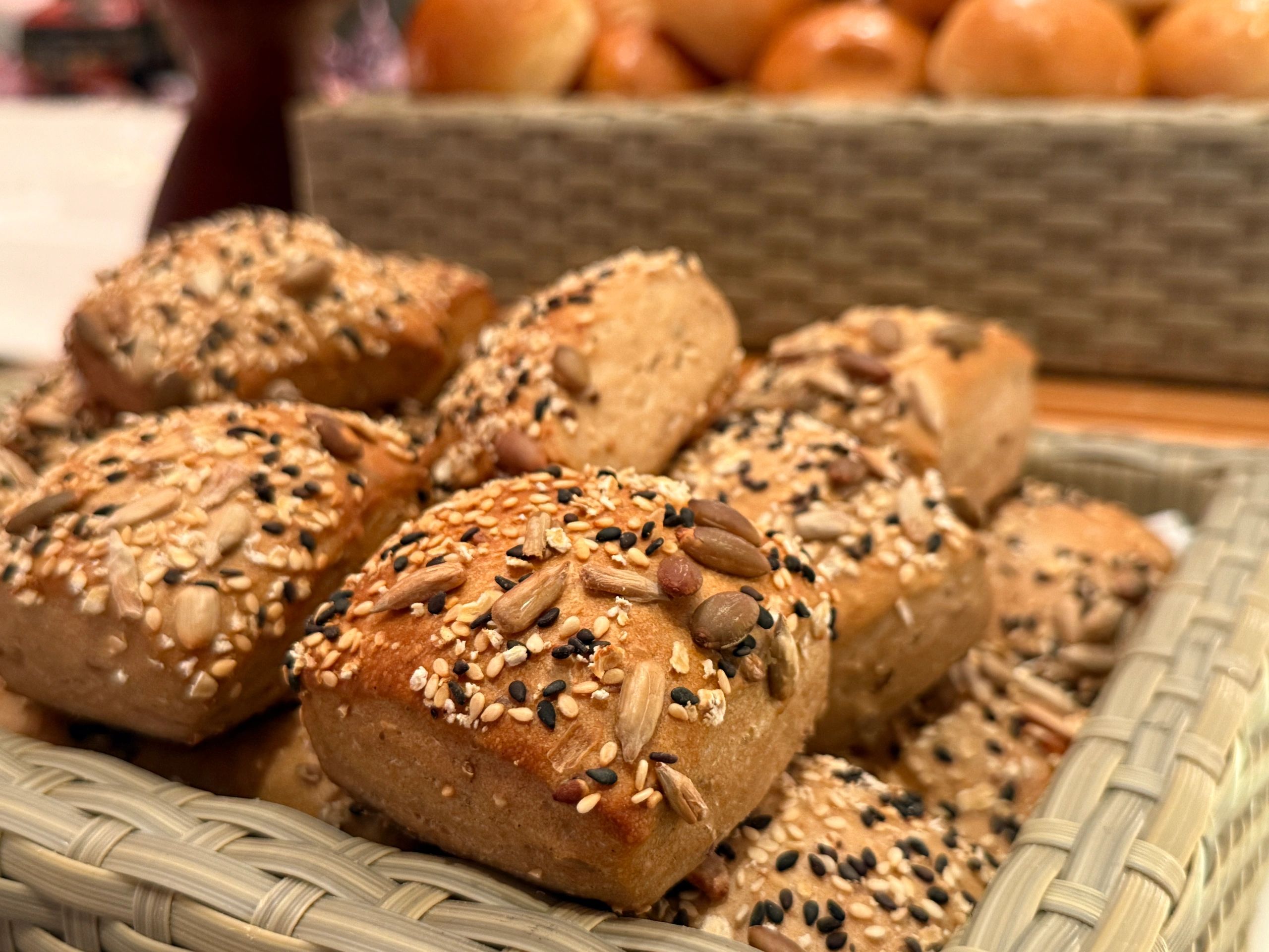 Basket of multigrain bread buns