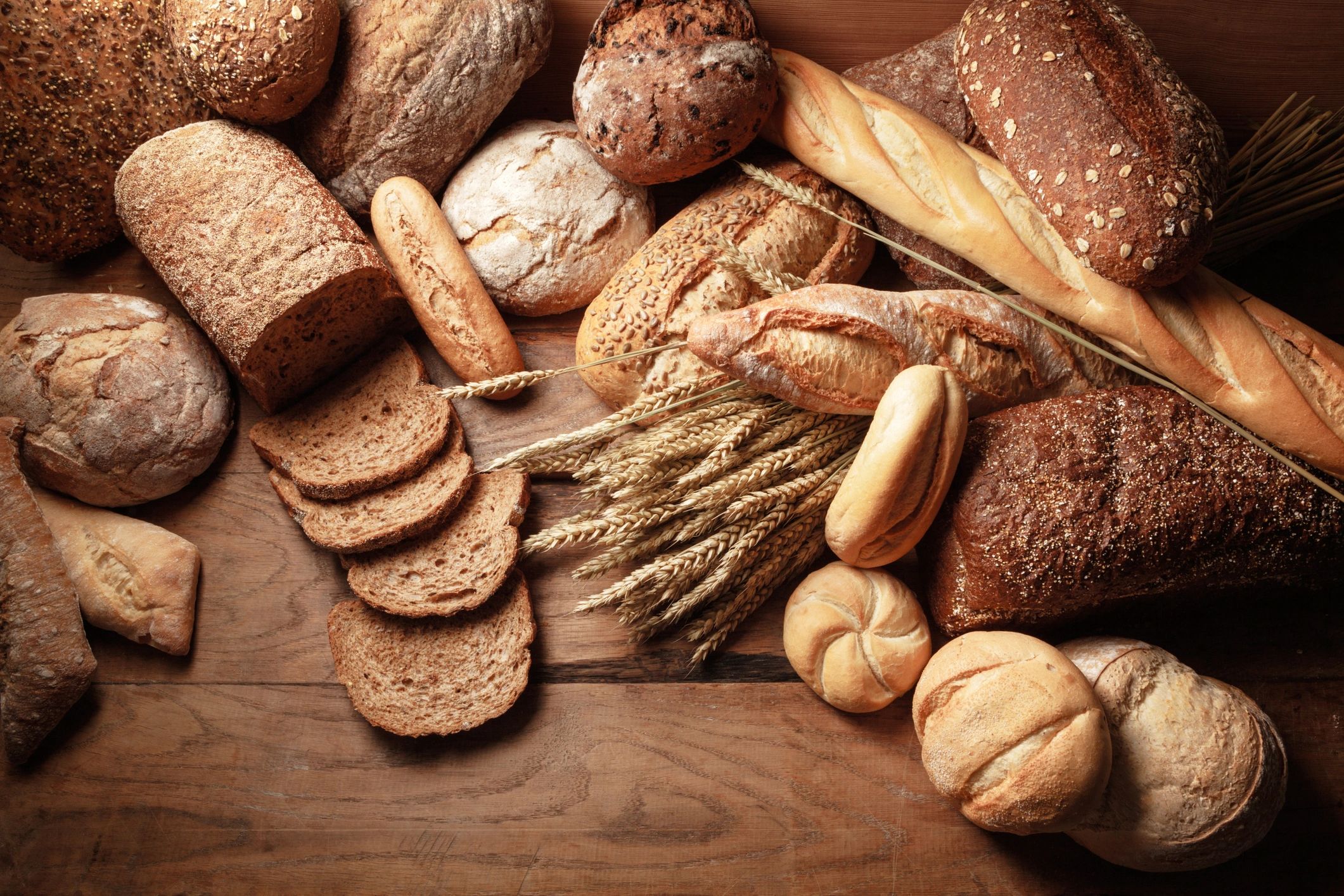 Assorted artisan breads arranged on a table